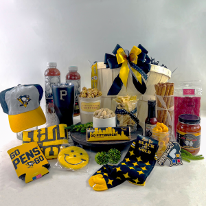 City of Champions gift basket that includes all things Pittsburgh including local snacks, Pretzels, Puffzels, O'Shea's Licorice, Sarris and more. As well it includes Pirate, Steelers and Pengin merchandise.