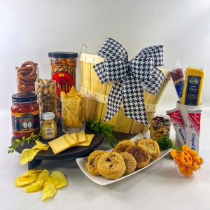 This is a plentiful gift basket full of cookies, chips, puffzels, tortilla chips, sarris chocolate candy, nuts, crackers, cheese , crackers, salami. It is presented in a bushel with a great bow.
