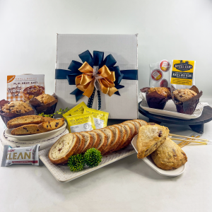 A gift that is presented in a box and is filled with fresh baked goods from the local Pittsburgh bakers. Delicious goodies.