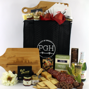 welcome to pittsburgh gifts in tote bag with cutting board and snacks