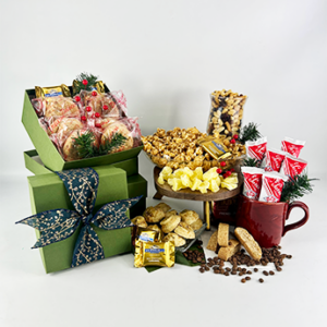 Photo of the olive tower gift with lots of cookies and snacks, finished with a pretty bow