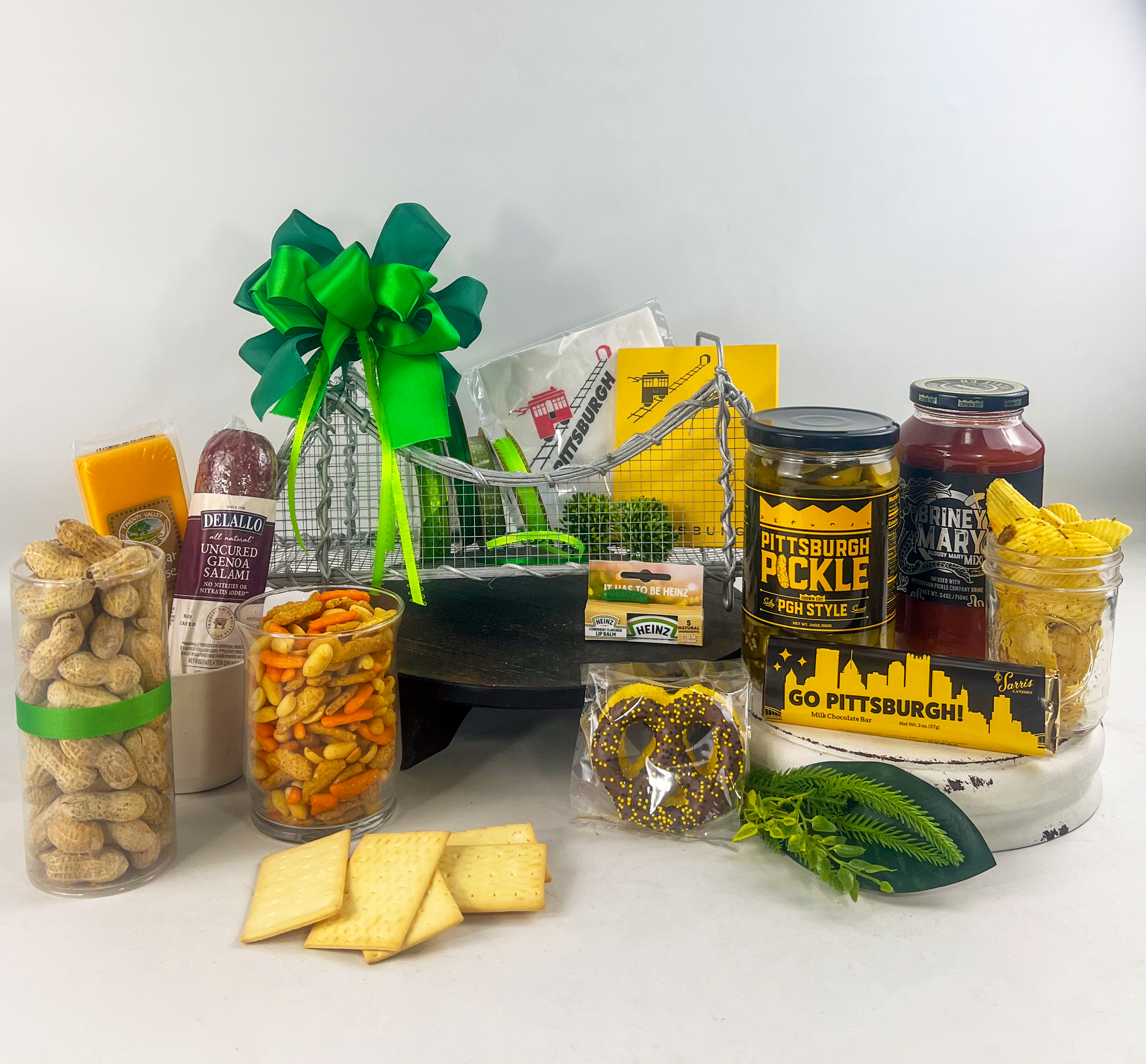 This gift is a nod to the pickle obsession in Pittsburgh. It contains everything pickle - potato chips, spicy shelled peanuts, chapstick, pickles, pins, etc.