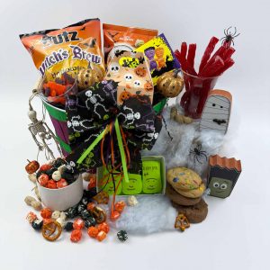 halloween gift with pretzels, licorice cookies, popcorn, candy